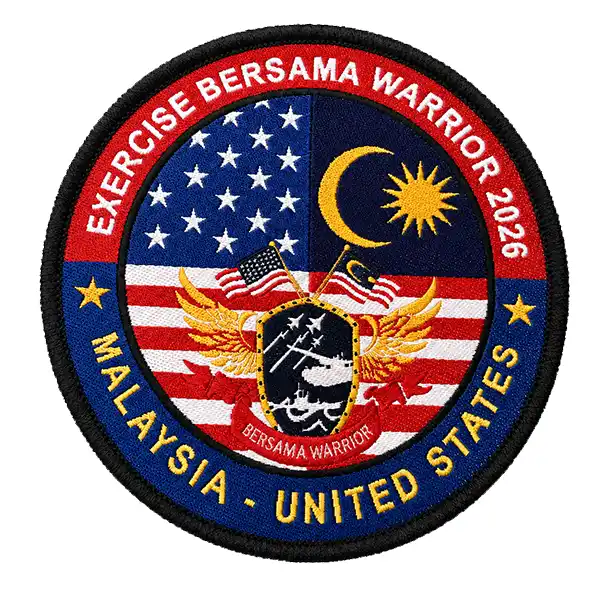 Round custom military embroidered patch for Exercise Bersama Warrior 2026 featuring Malaysia and United States flag details.