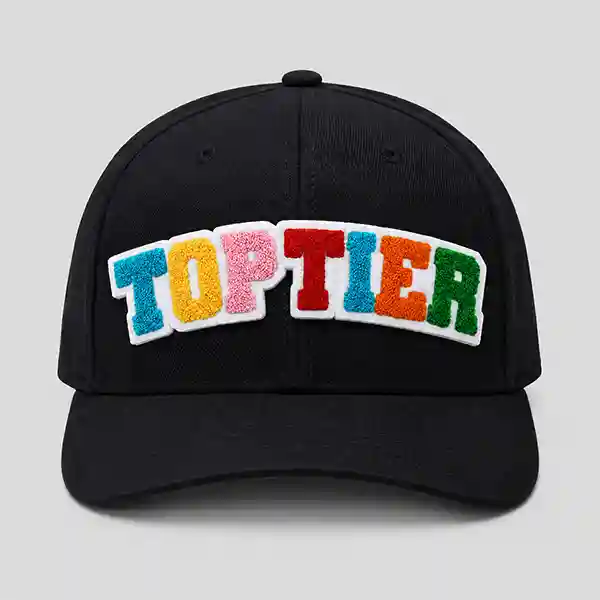 Multicolor custom chenille letter patch with “TOPTIER” text applied to the front of a black baseball cap.