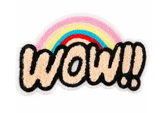 Custom chenille patch with beige “WOW!!” lettering, black outline, and a colorful rainbow design.