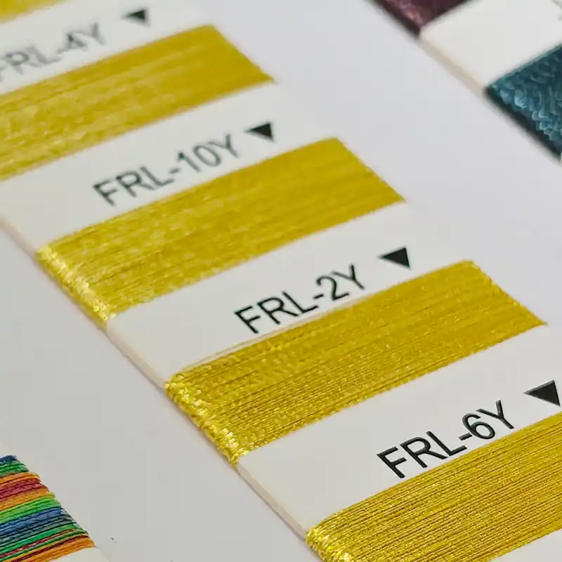 Metallic embroidery thread color samples used for custom embroidered patches and badge production.