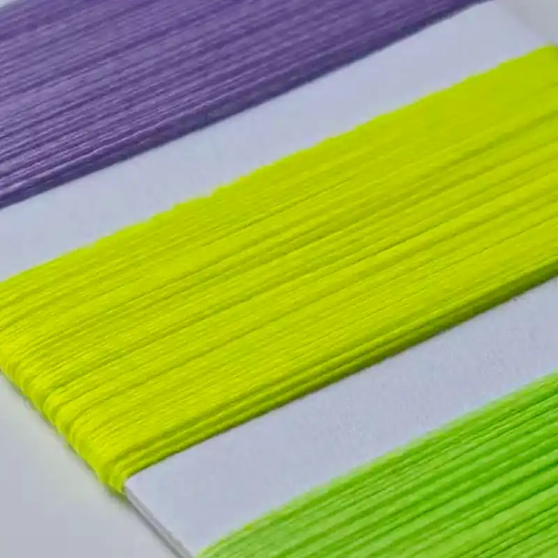Neon embroidery thread color samples used for custom embroidered patches and badge production.